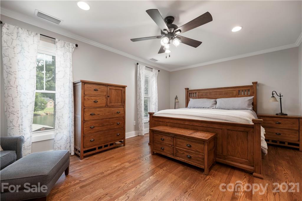 148 Lakeland Road Mooresville, NC 28117 - Photo 14 of 48 a bedroom with a bed and furniture