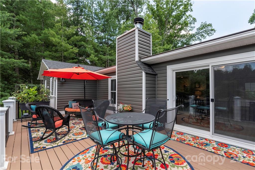 148 Lakeland Road Mooresville, NC 28117 - Photo 24 of 48 a backyard of a house with table and chairs
