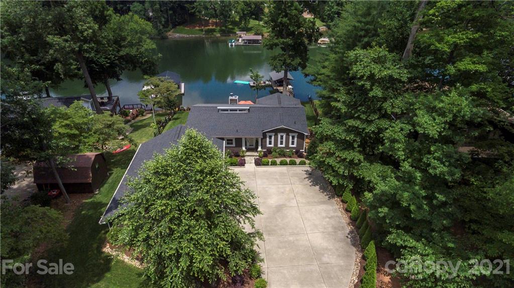 148 Lakeland Road Mooresville, NC 28117 - Photo 38 of 48 an aerial view of a house with outdoor space and lake view