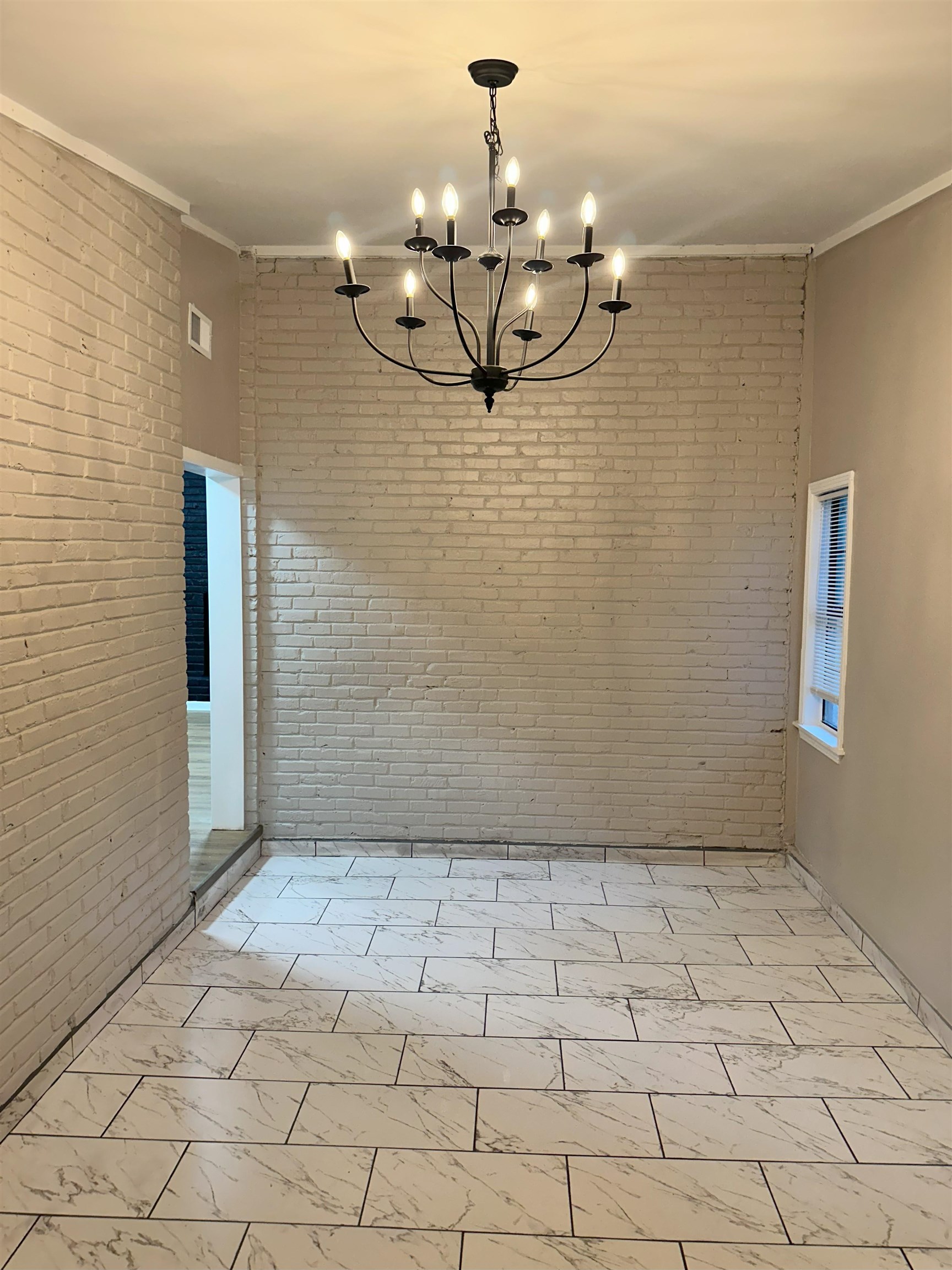 2820 Range Line Road Memphis, TN 38127 - Photo 11 of 35 a view of a livingroom with a chandelier