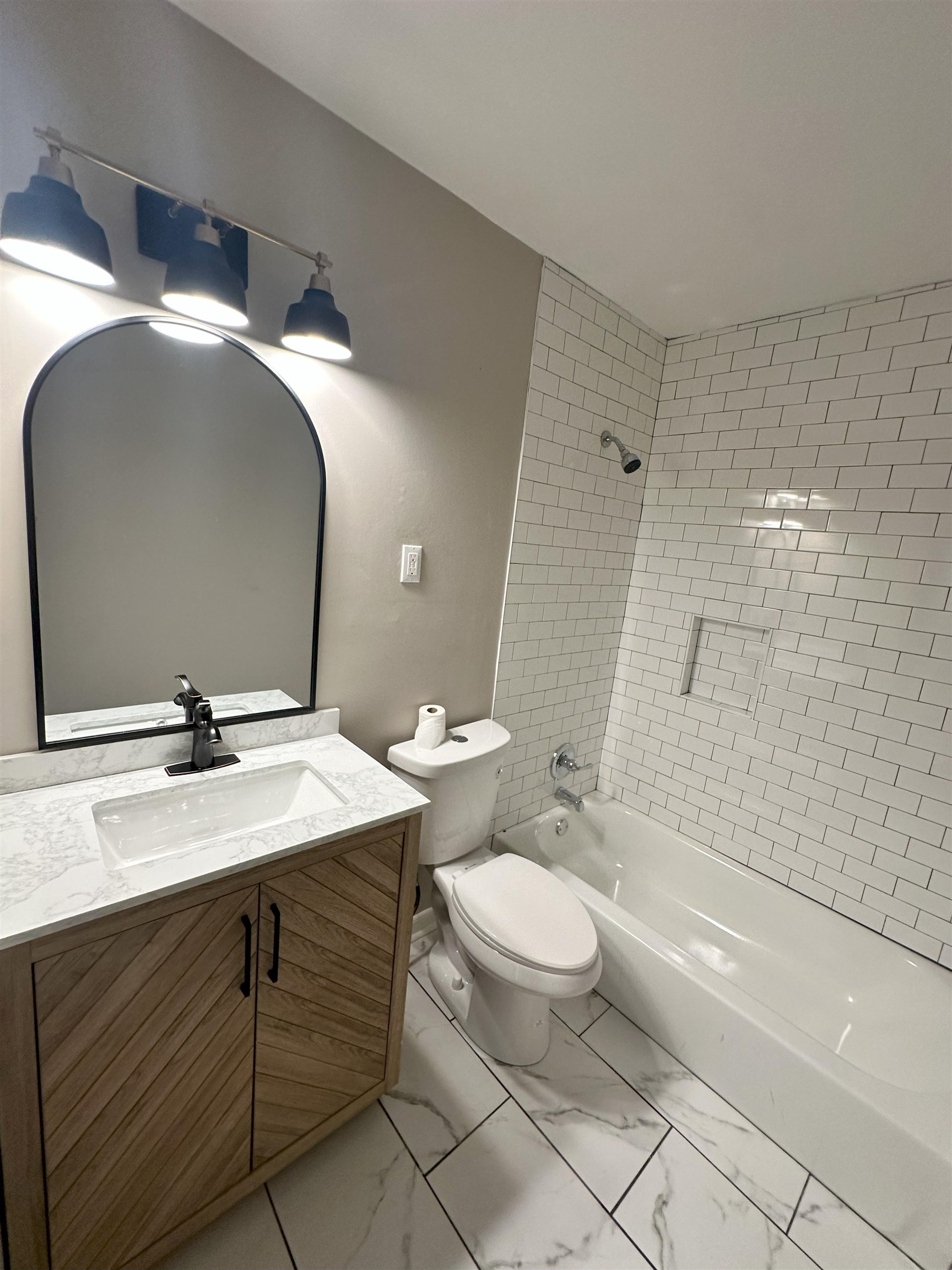 2820 Range Line Road Memphis, TN 38127 - Photo 14 of 35 a bathroom with a sink toilet and shower