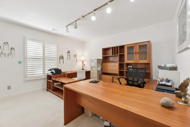 a room with furniture pool table and flat screen tv