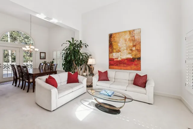 a living room with furniture and a couch