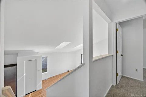 a view of hallway with stairs