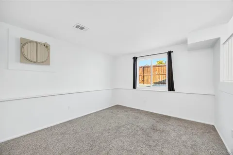 a view of a window in an empty room