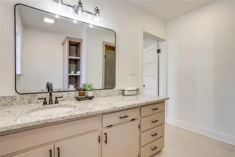 a view of a swimming pool with a garden