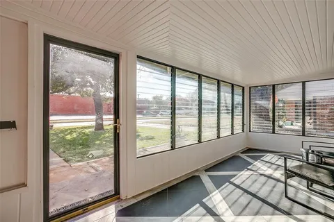 a view of workspace with large windows