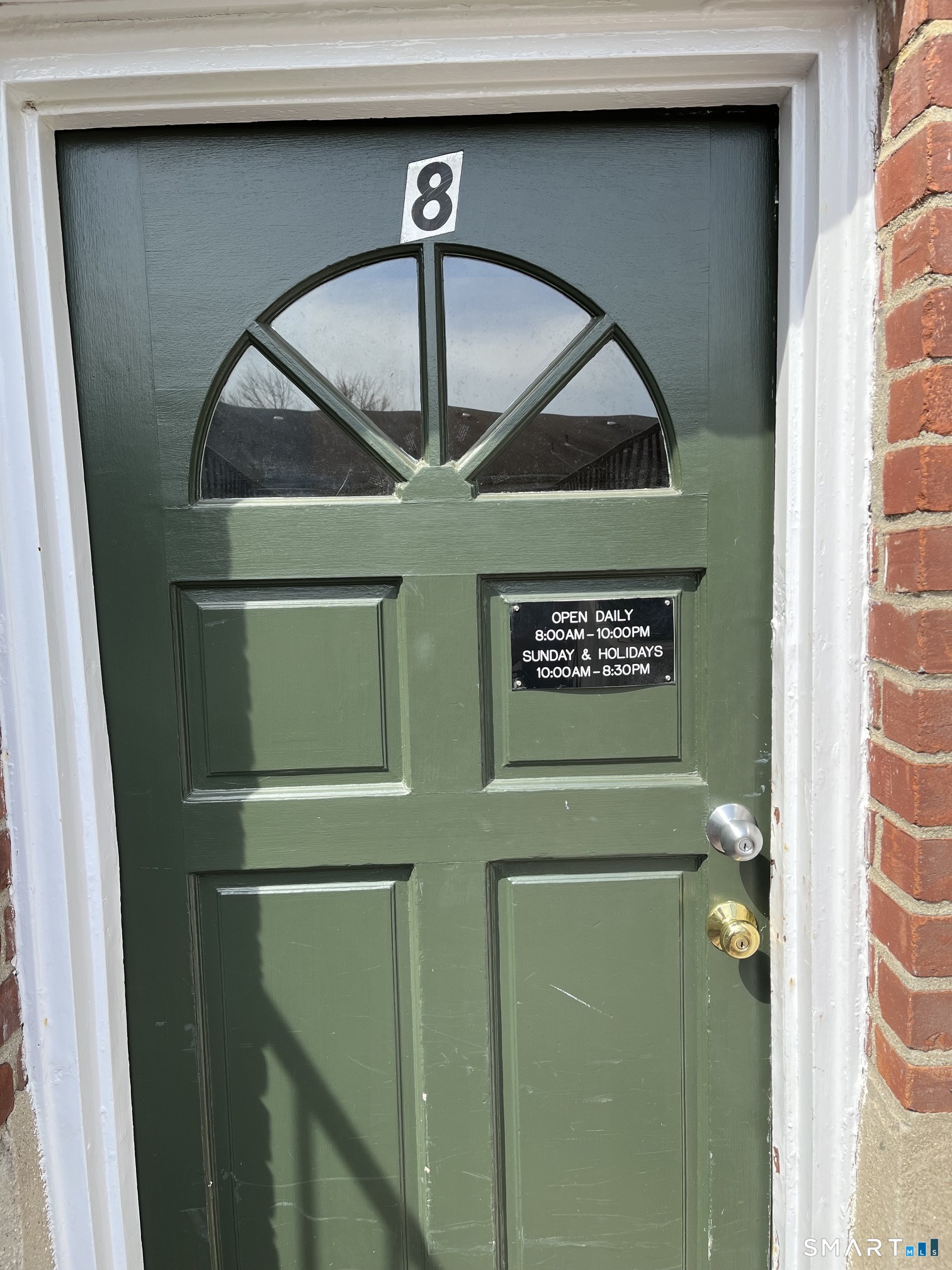 250 Glenbrook Road, Unit 38C Stamford, CT 06906 - Photo 17 of 23 Exterior entry to laundry room door #8 located downstairs in unit building