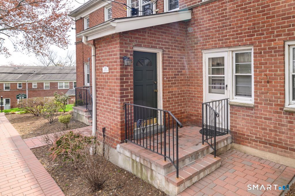 250 Glenbrook Road, Unit 38C Stamford, CT 06906 - Photo 18 of 23 Rear entrance from parking lot near space #67