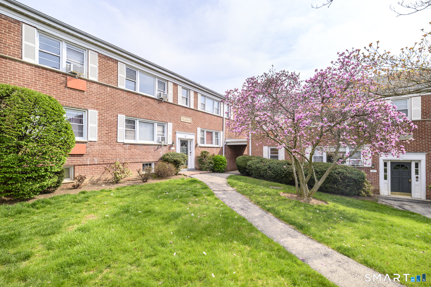 250 Glenbrook Road, Unit 38C Stamford, CT 06906 - Photo 22 of 23 Complex with abundant green space.