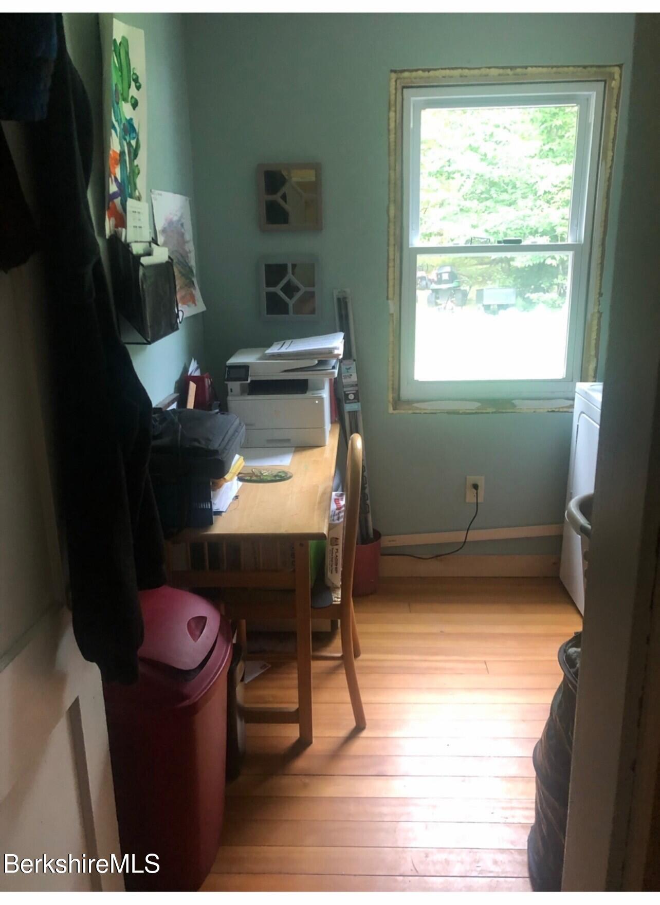 9 Greylock Circle Peru, MA 01235 - Photo 16 of 19 a room with a table and a window