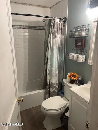 a utility room with a window a washer and dryer