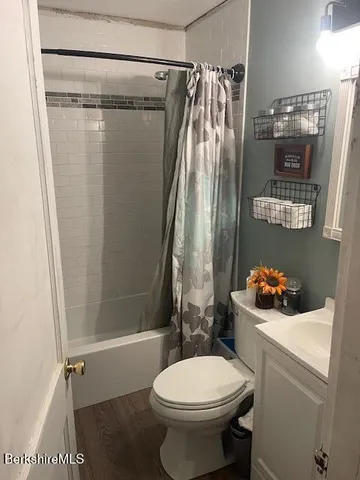 a utility room with a window a washer and dryer