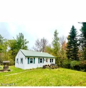 a view of house with outdoor space