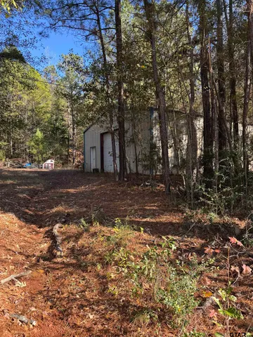 a house view with a outdoor space
