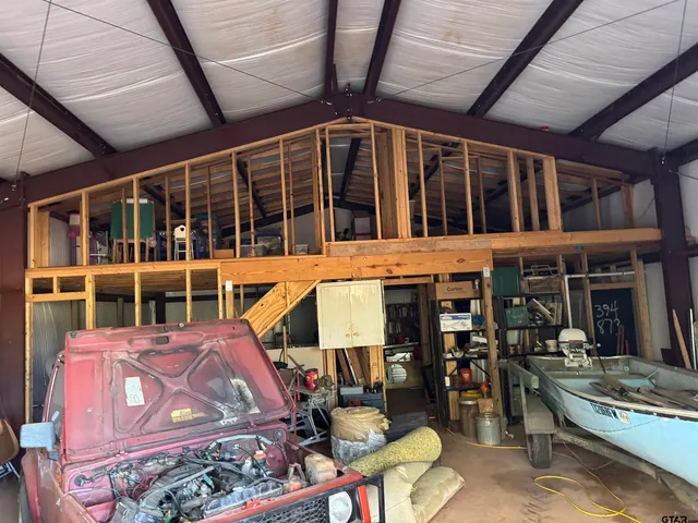 a view of a building with sitting area