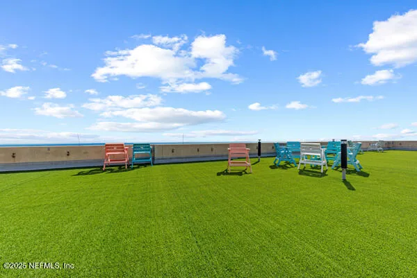 a view of a golf course with a house