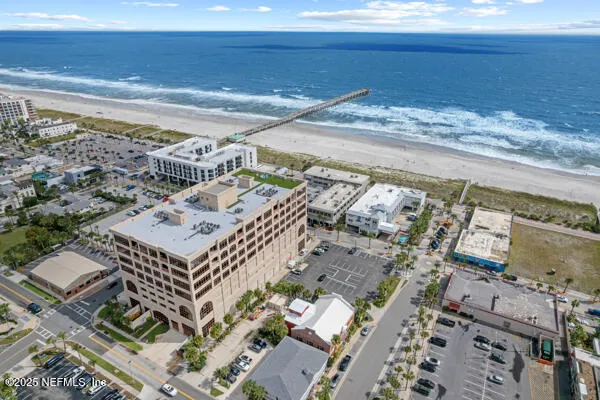 a view of a city with an ocean view