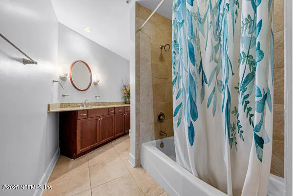 a bathroom with a sink a vanity and a mirror