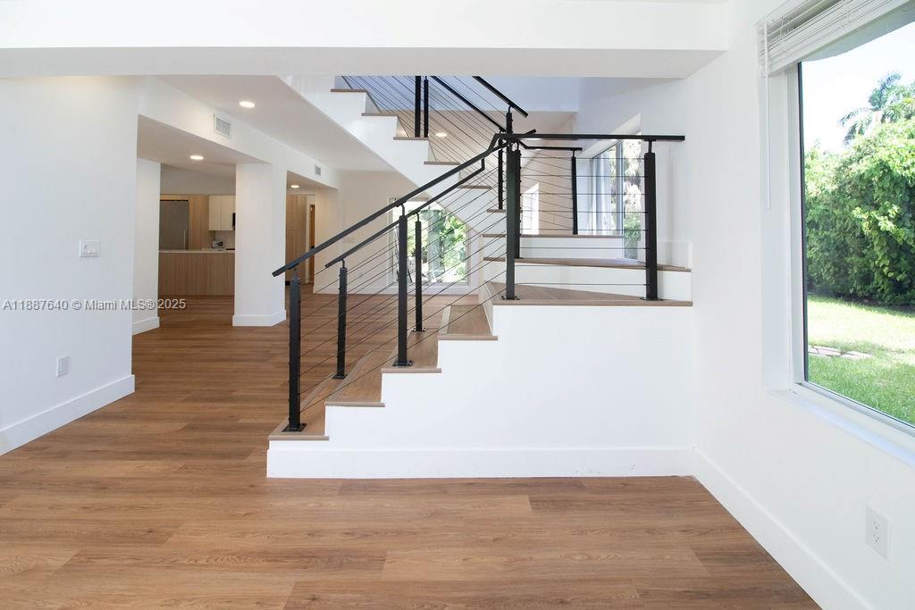 1255 Jackson Street Hollywood, FL 33019 - Photo 19 of 72 a view of entryway and hall with wooden floor