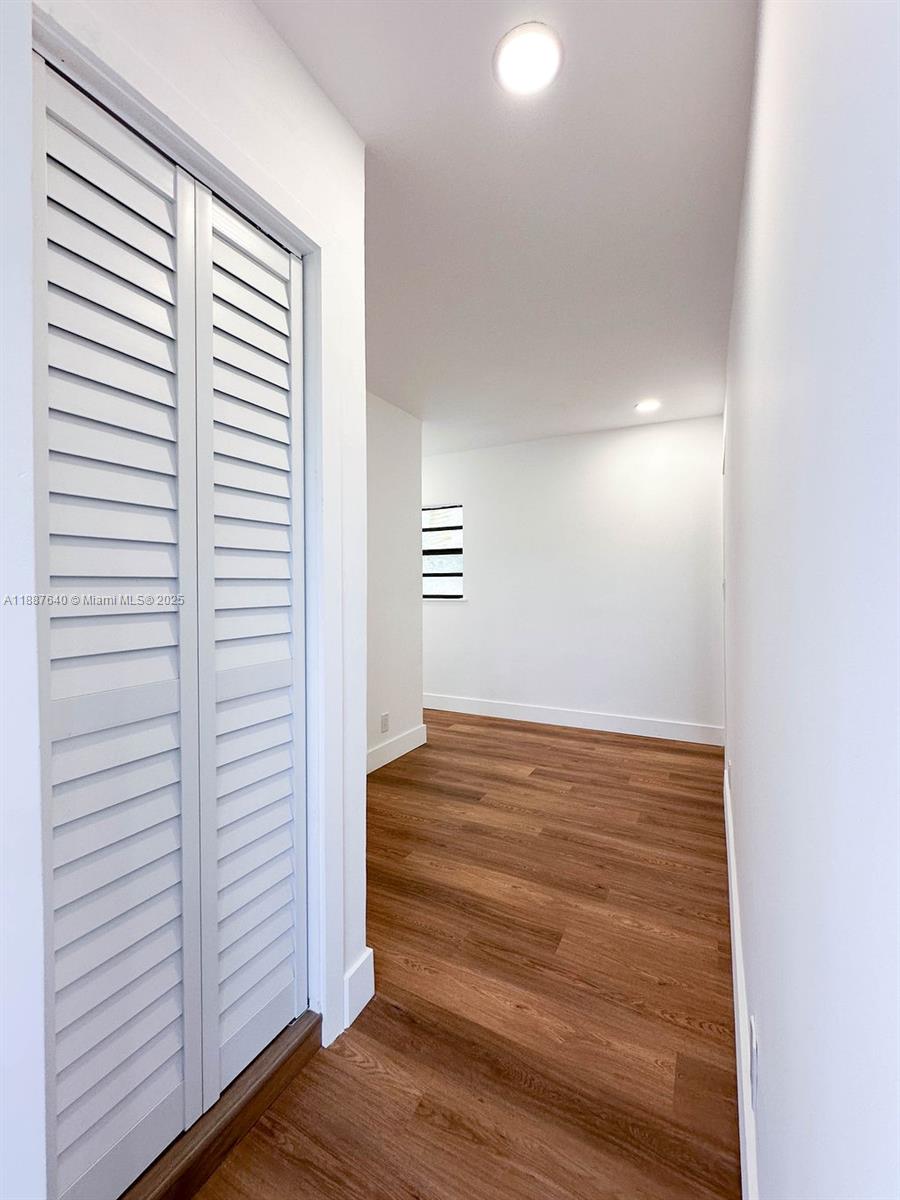 1255 Jackson Street Hollywood, FL 33019 - Photo 41 of 72 a view of empty room with wooden floor