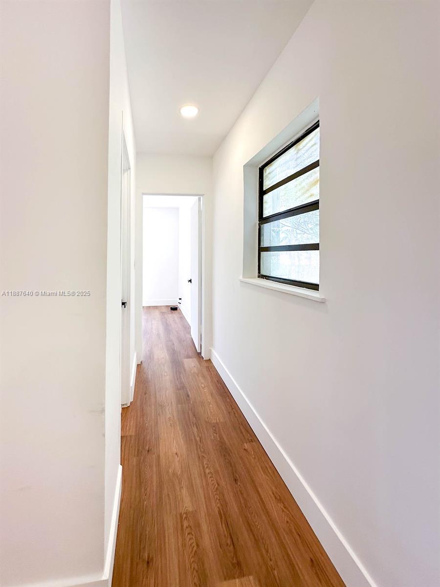 1255 Jackson Street Hollywood, FL 33019 - Photo 43 of 72 a view of a room with wooden floor and a window