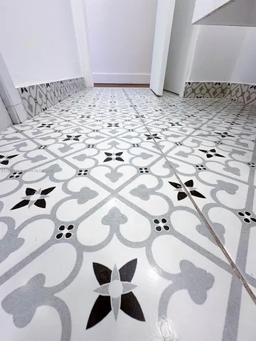 a bathroom with a toilet and a sink