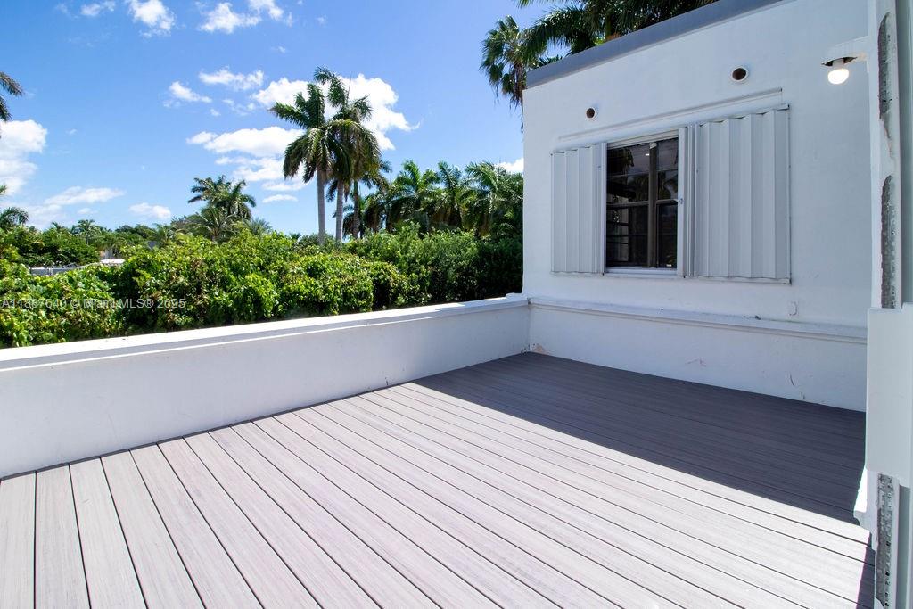 1255 Jackson Street Hollywood, FL 33019 - Photo 61 of 72 a view of a balcony with an outdoor space