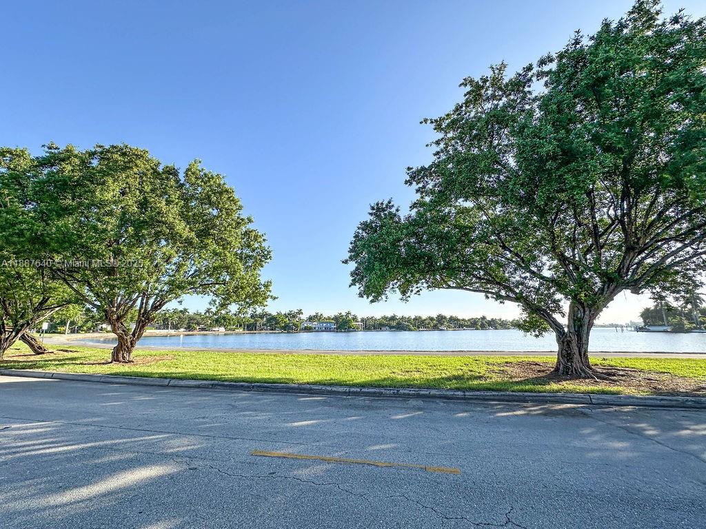 1255 Jackson Street Hollywood, FL 33019 - Photo 71 of 72 a view of a swimming pool and an outdoor space