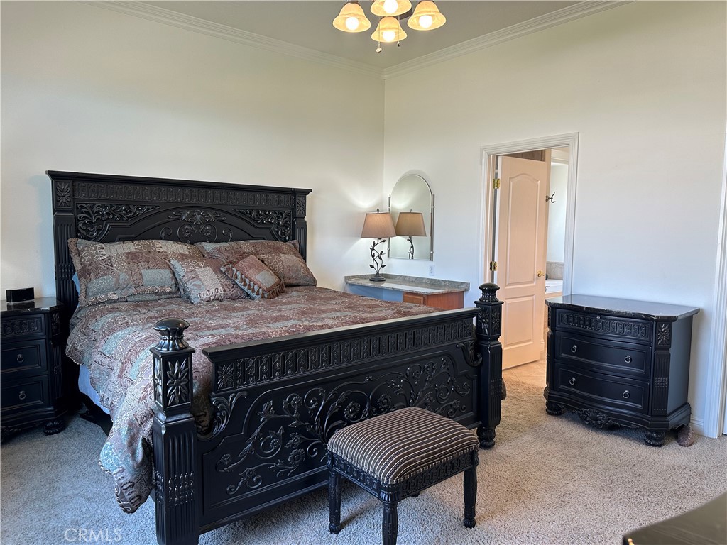 14108 Rivers Edge Road Helendale, CA 92342 - Photo 15 of 37 a bedroom with a bed and a dresser