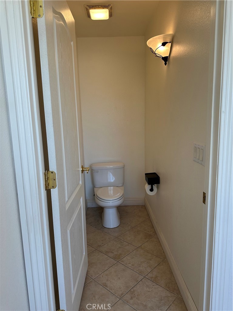 14108 Rivers Edge Road Helendale, CA 92342 - Photo 17 of 37 a bathroom with a toilet and a shower