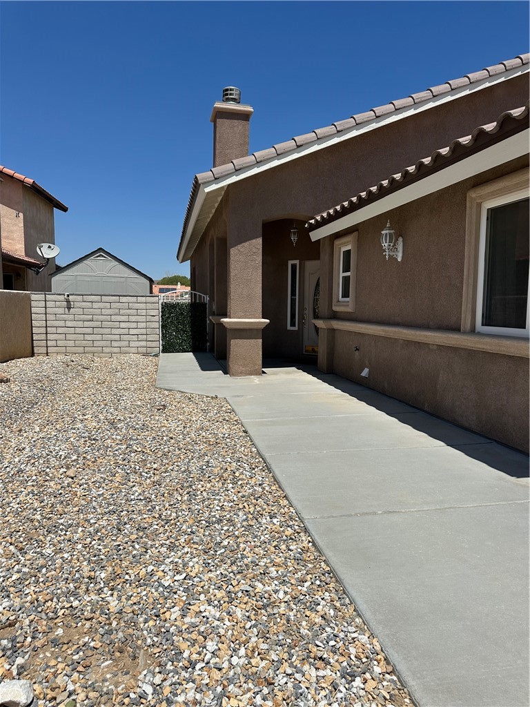 14108 Rivers Edge Road Helendale, CA 92342 - Photo 2 of 37 a black and white building with a outdoor space