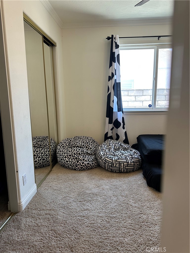 14108 Rivers Edge Road Helendale, CA 92342 - Photo 28 of 37 a bedroom with a bed and a window