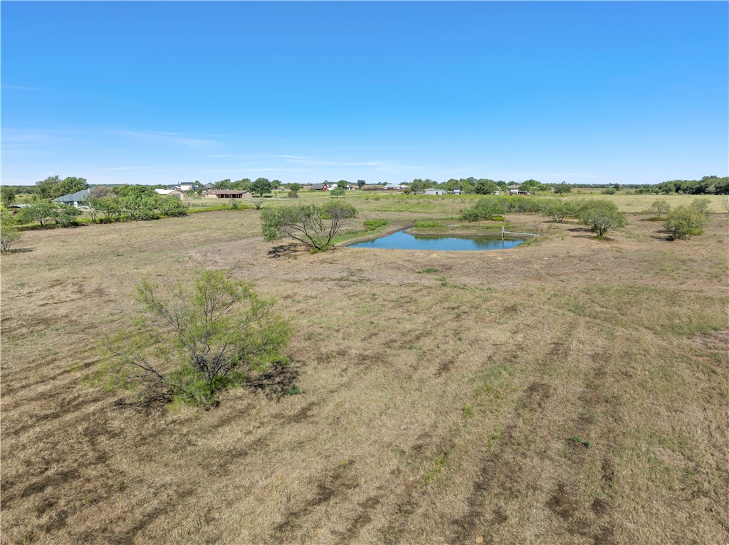 847 North Rock Creek Road China Spring, TX 76633 - Photo 2 of 5 a view of a lake with houses in the back