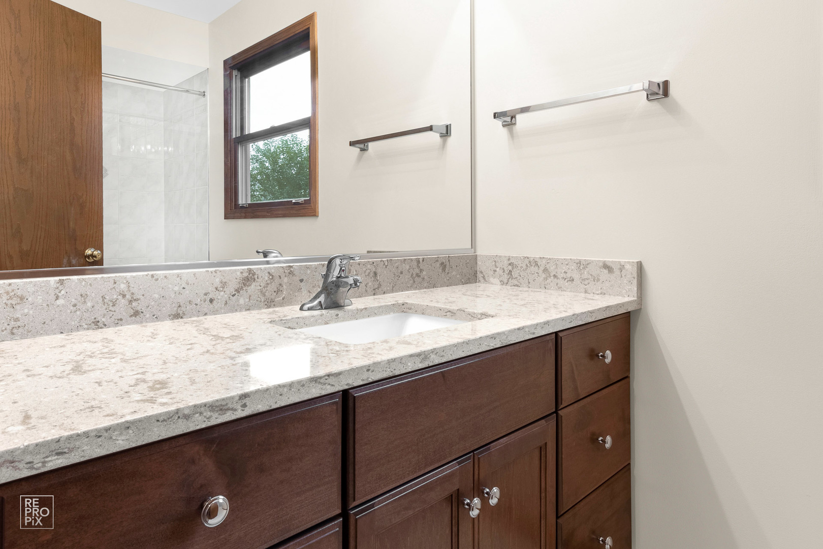 1205 East Camp McDonald Road Prospect Heights, IL 60070 - Photo 14 of 21 a bathroom with a granite countertop sink and a mirror
