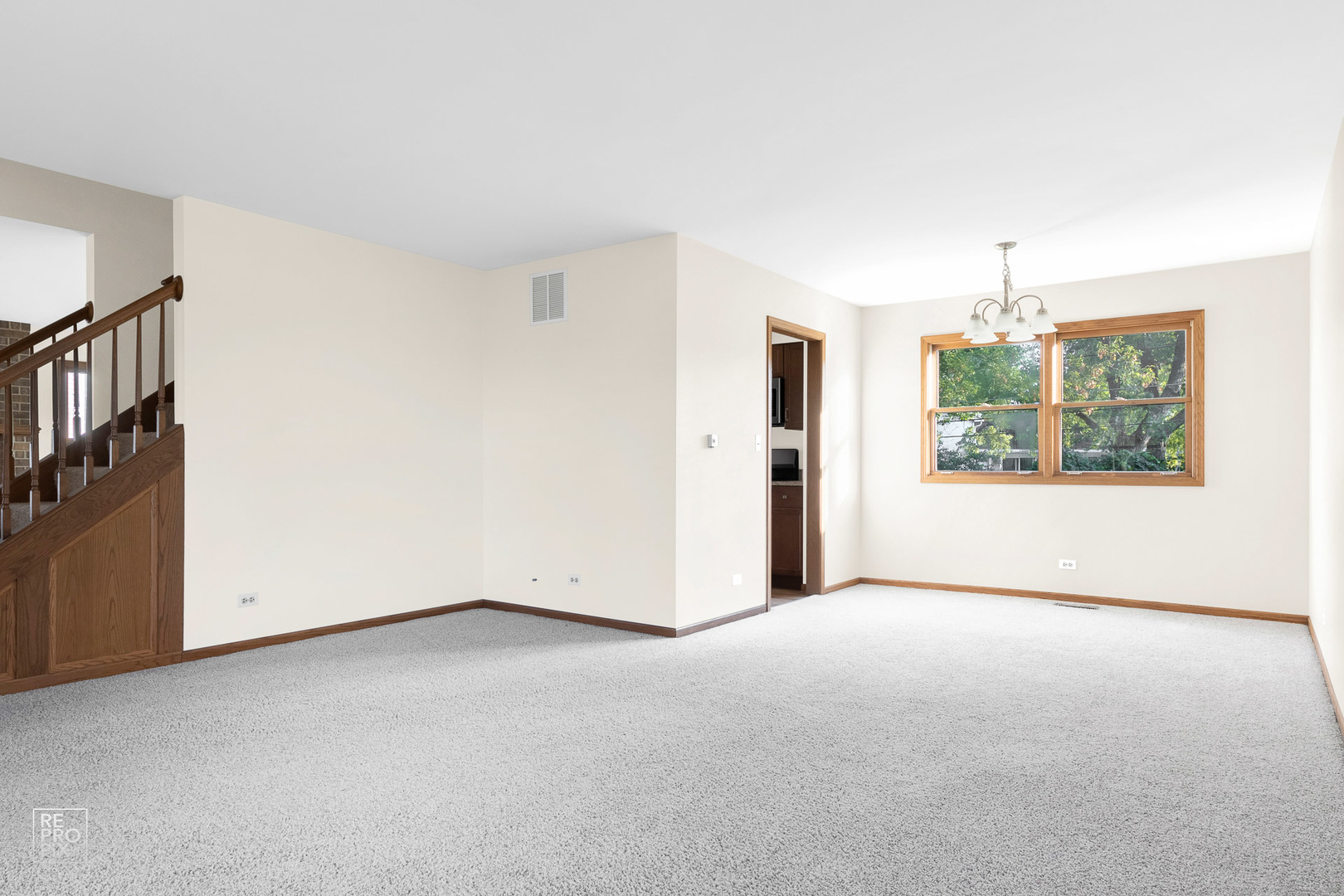 1205 East Camp McDonald Road Prospect Heights, IL 60070 - Photo 4 of 21 a view of an empty room with a window