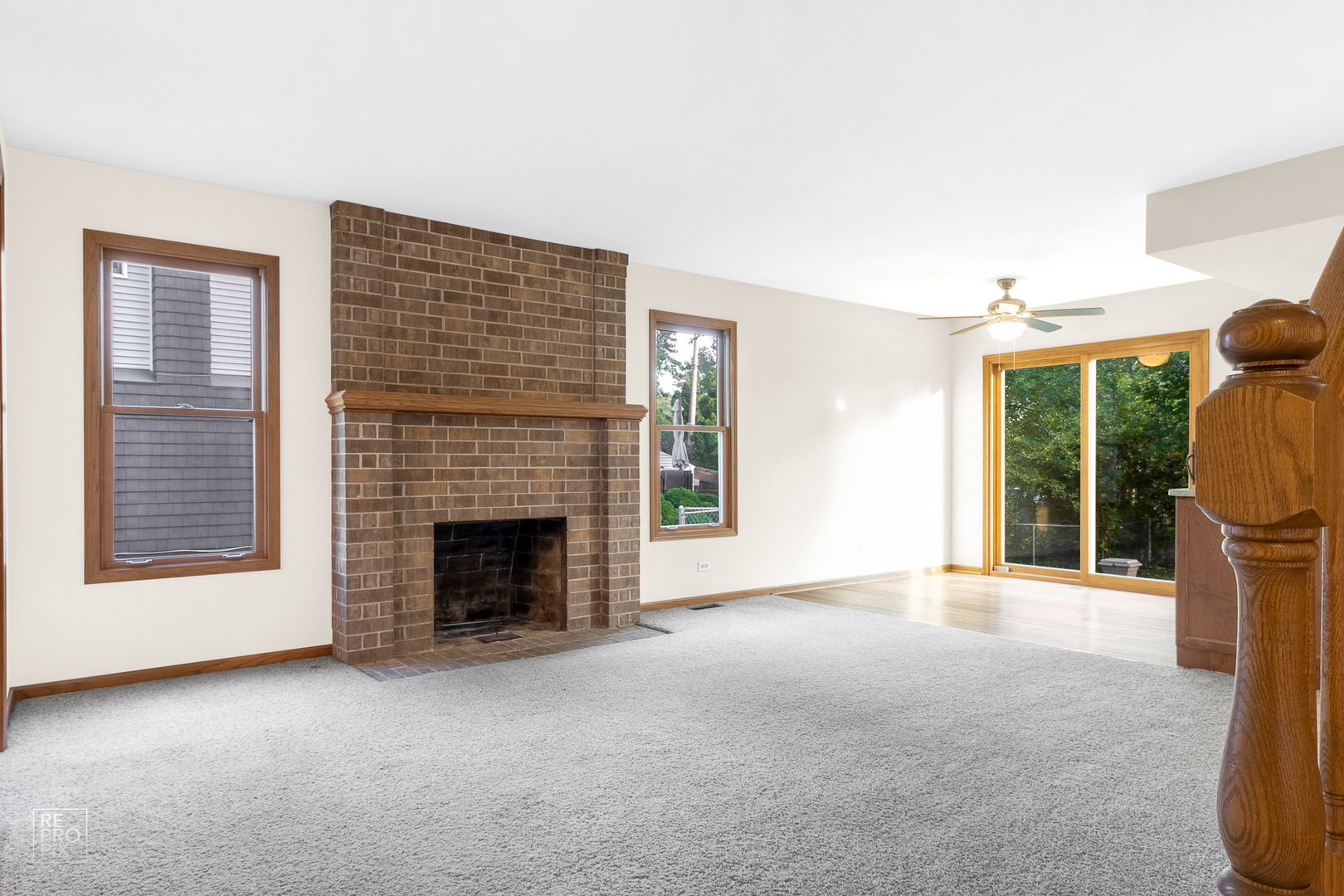 1205 East Camp McDonald Road Prospect Heights, IL 60070 - Photo 7 of 21 a view of empty room with fireplace and window