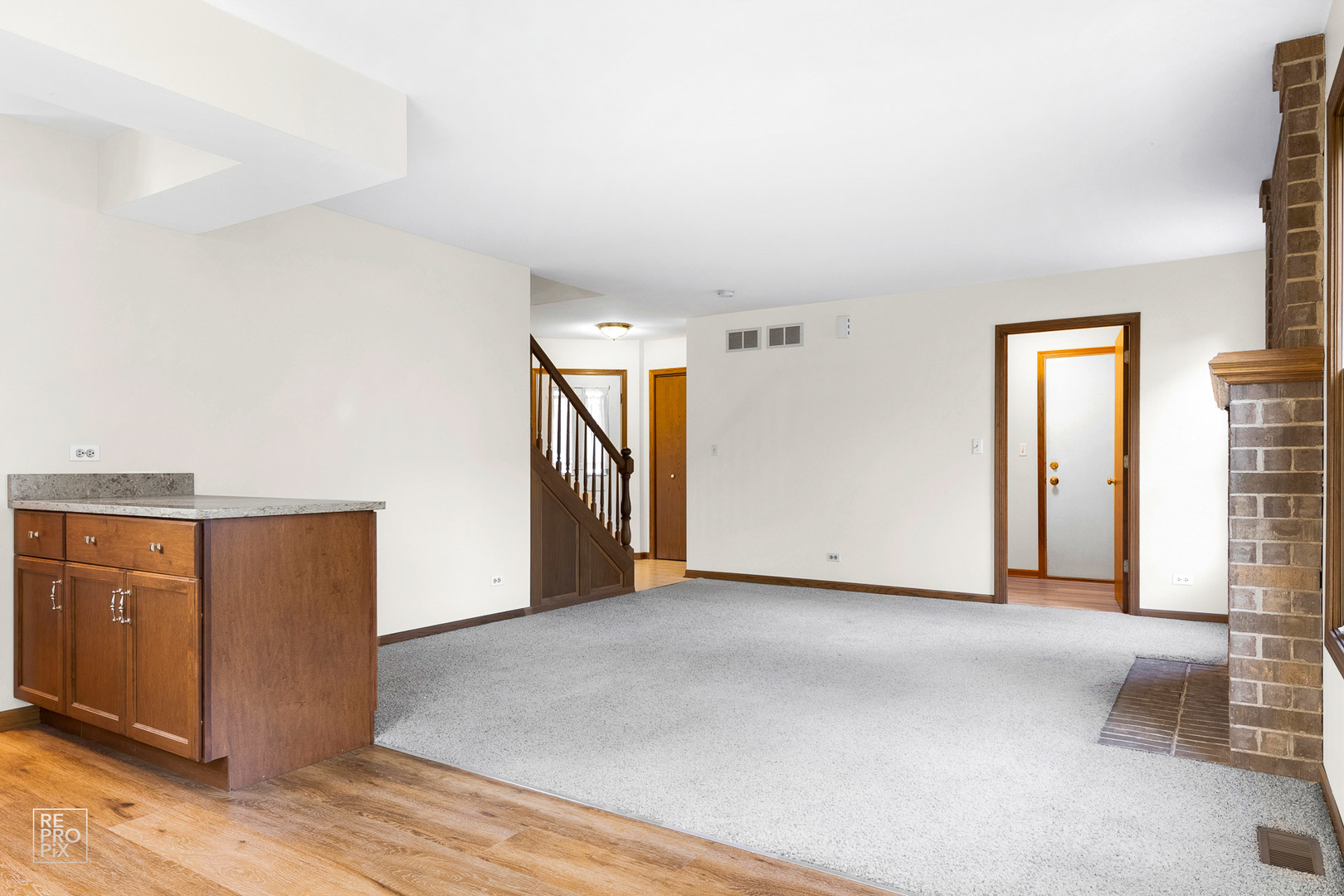 1205 East Camp McDonald Road Prospect Heights, IL 60070 - Photo 8 of 21 an empty room with windows