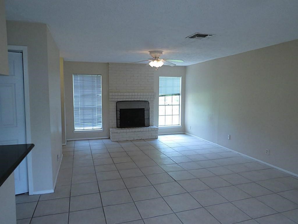 9535 Clanton Street Houston, TX 77080 - Photo 6 of 22 Spacious living area with plenty of natural light, perfect for relaxing or entertaining.
