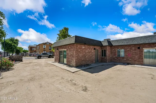 a view of a house with a snow yard and a yard