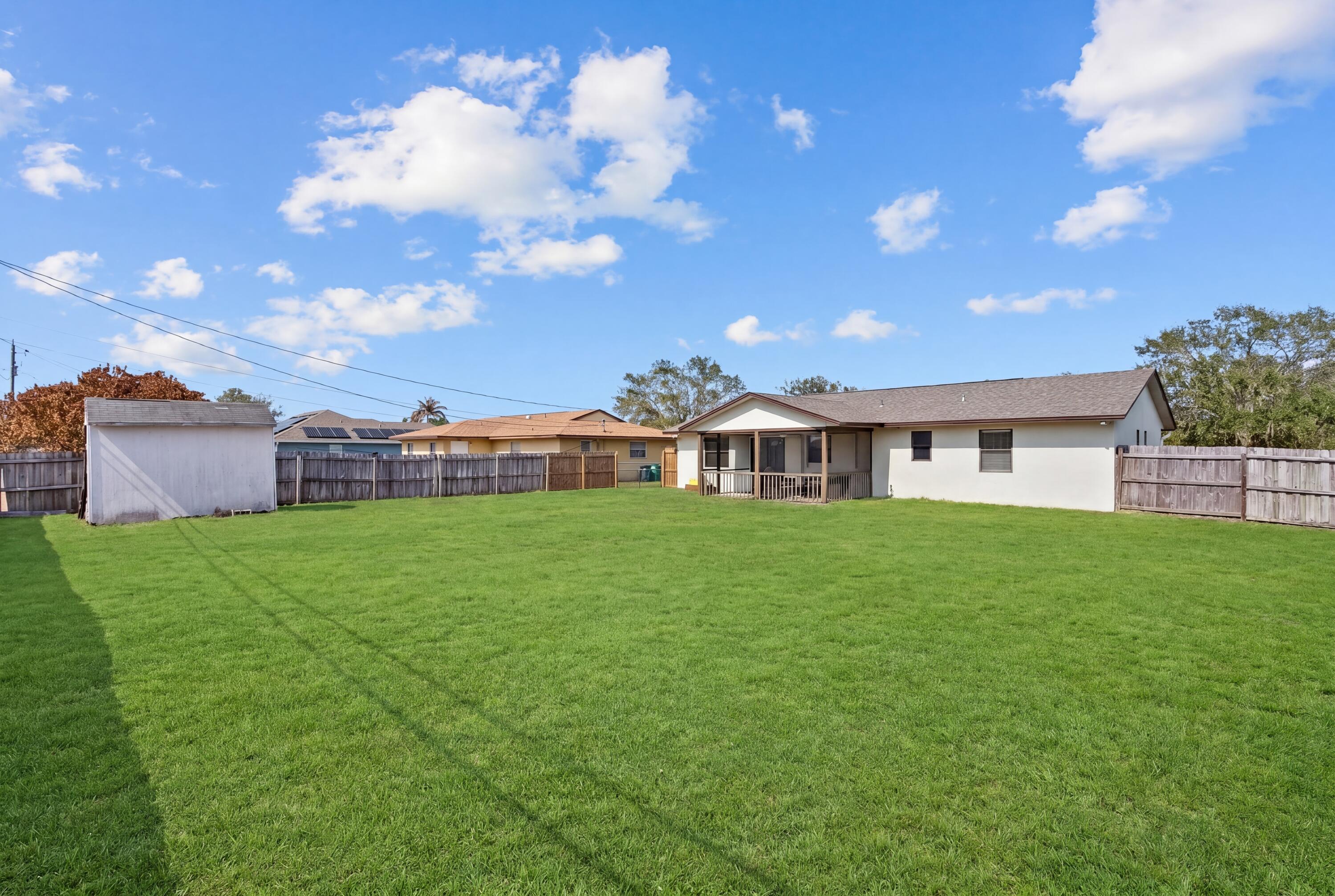 822 Southwest Harvard Road Port St. Lucie, FL 34953 - Photo 27 of 29 DSC09130_grass