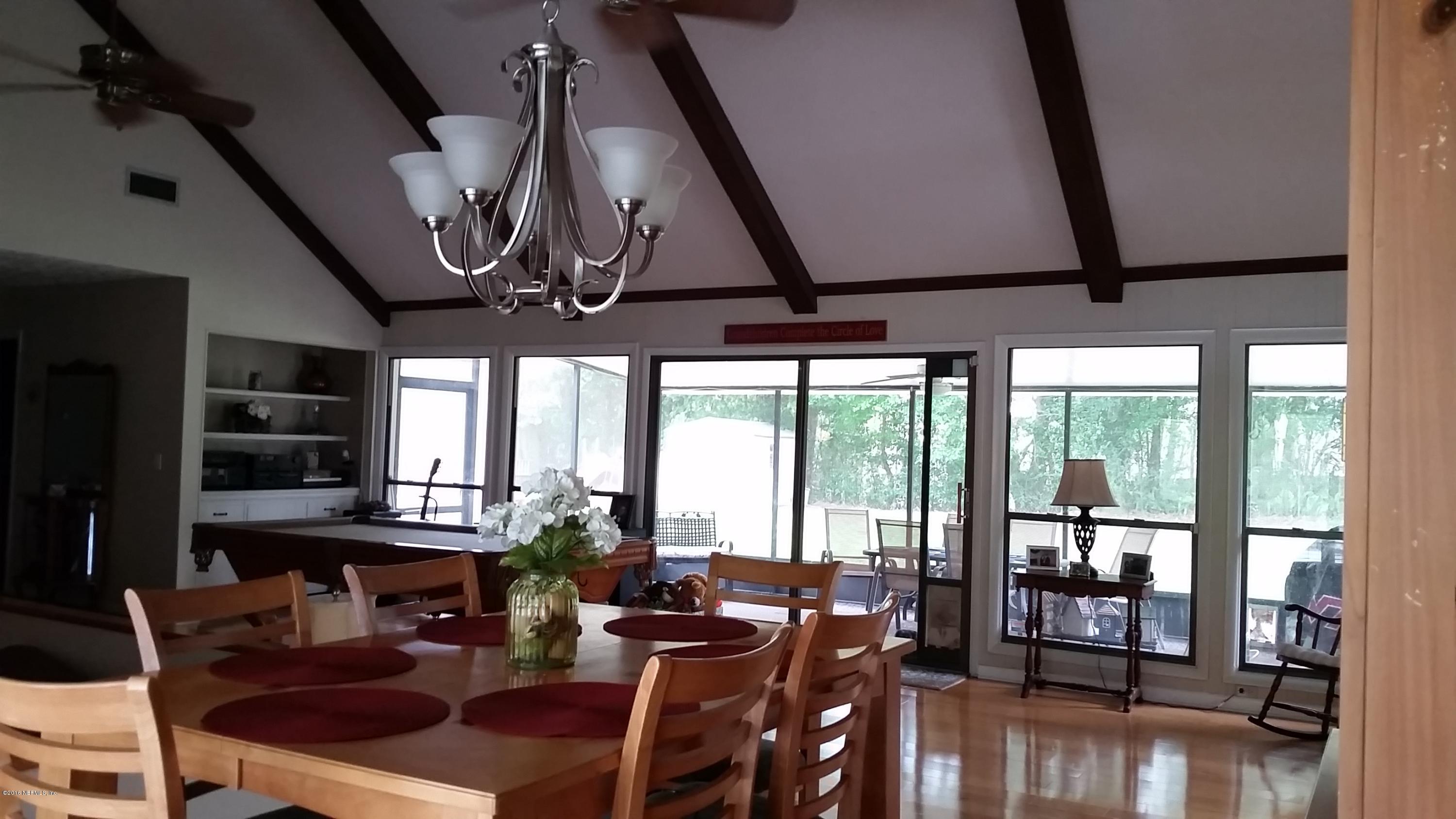 3373 Hermitage Road Jacksonville, FL 32277 - Photo 10 of 61 10 Family Room Dining to Outside