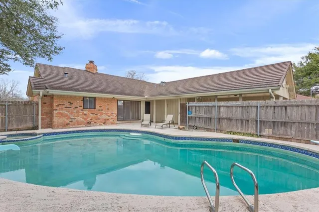 front view of a house with a street