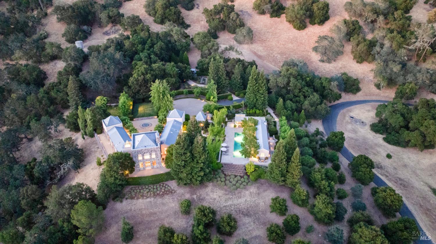 an aerial view of multiple house with outdoor space