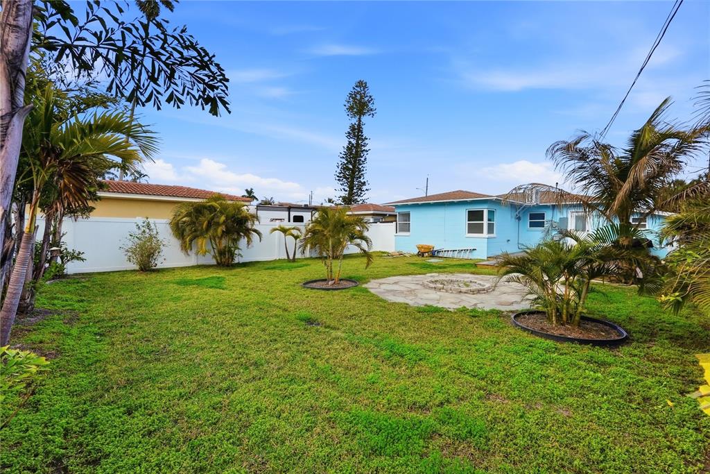 15424 2nd Street East Madeira Beach, FL 33708 - Photo 21 of 30 a view of a house with a yard