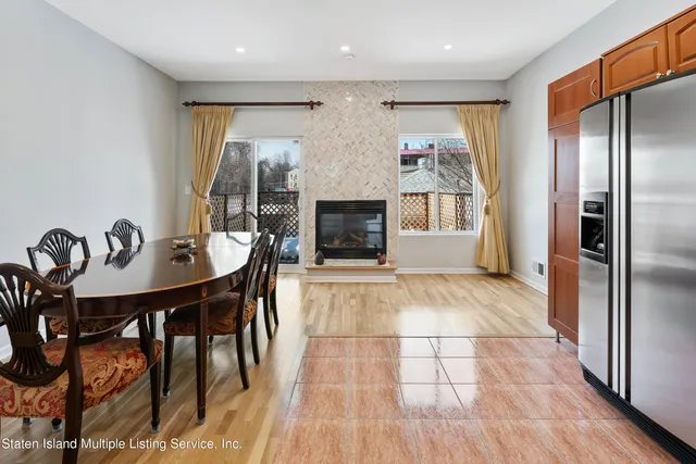 a view of a livingroom with furniture and a fireplace