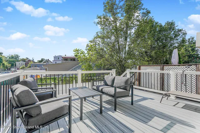 a view of a chairs on wooden deck