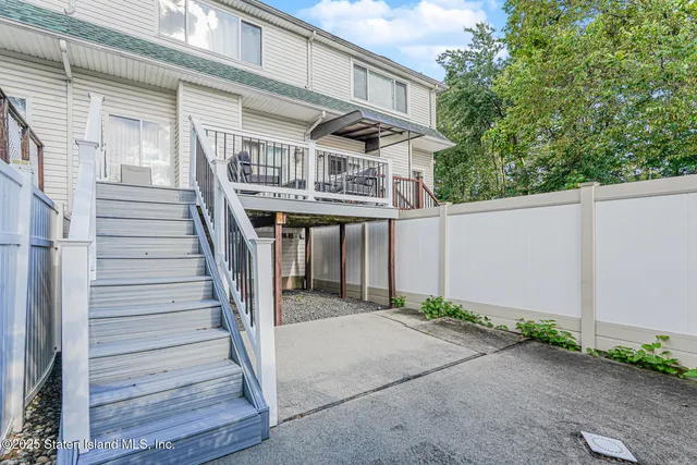 a balcony view with a garden space