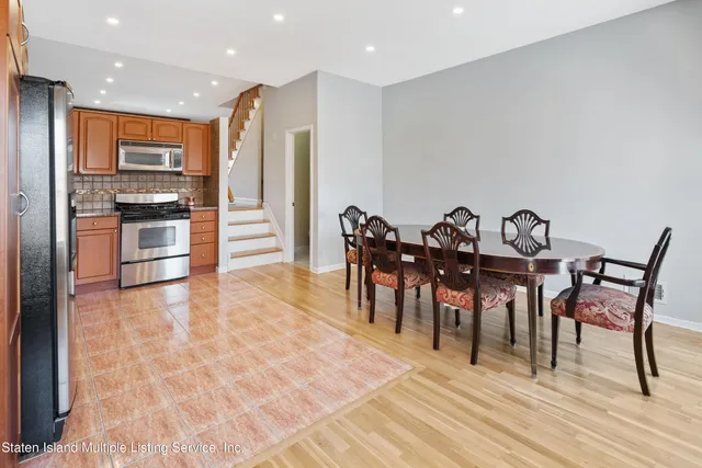 a view of a dining room with furniture