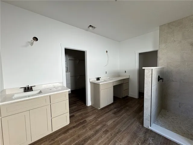 a kitchen with a sink and refrigerator